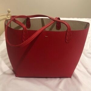 Red embossed tote bag fake leather